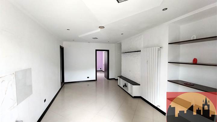 APPARTAMENTO CON BOX E GIARDINO PRIVATO